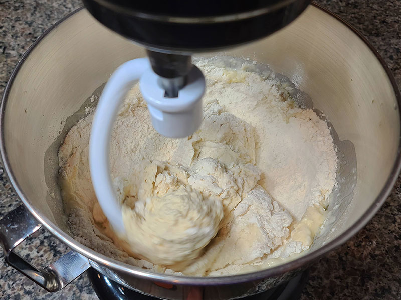 Pizza dough being mixed