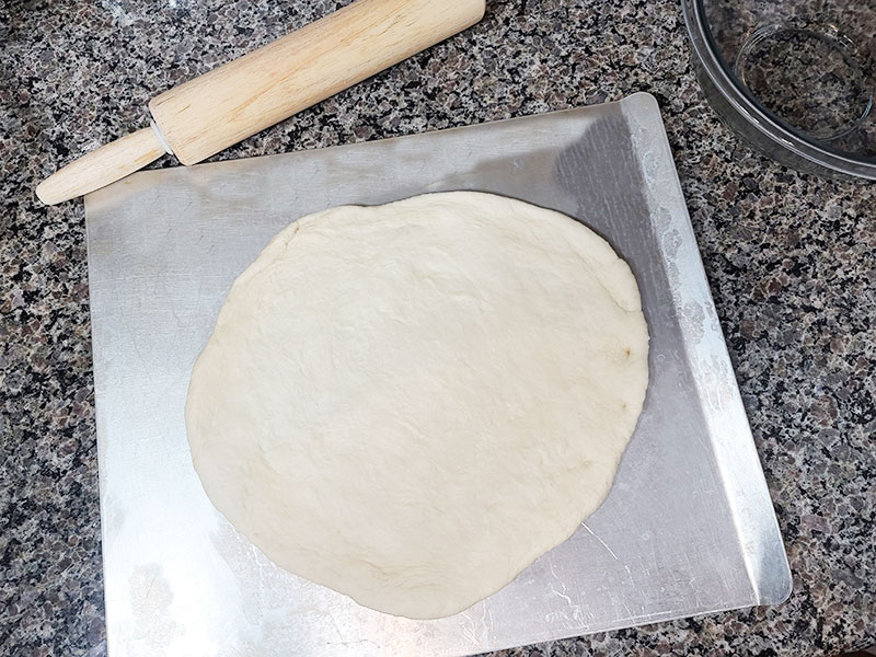 pizza dough rolled out