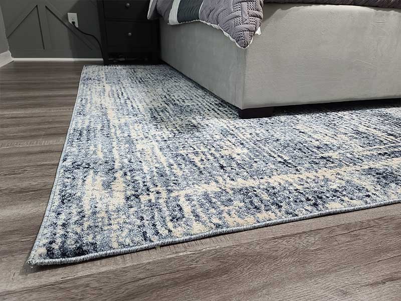 new blue and gray rug for bedroom makeover
