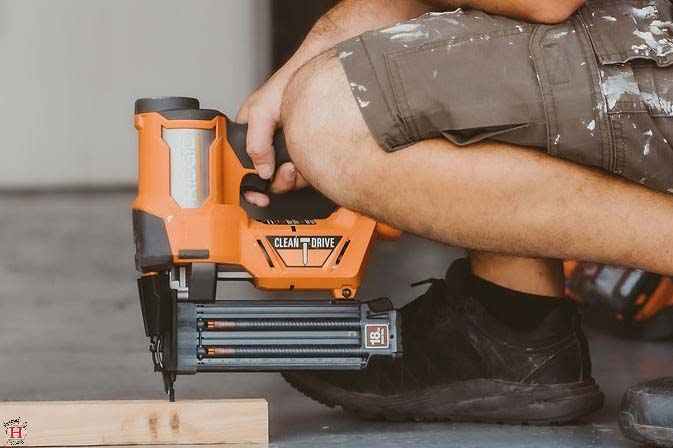 RIDGID 18v cordless nailgun in use as one of the must have tools for DIYers